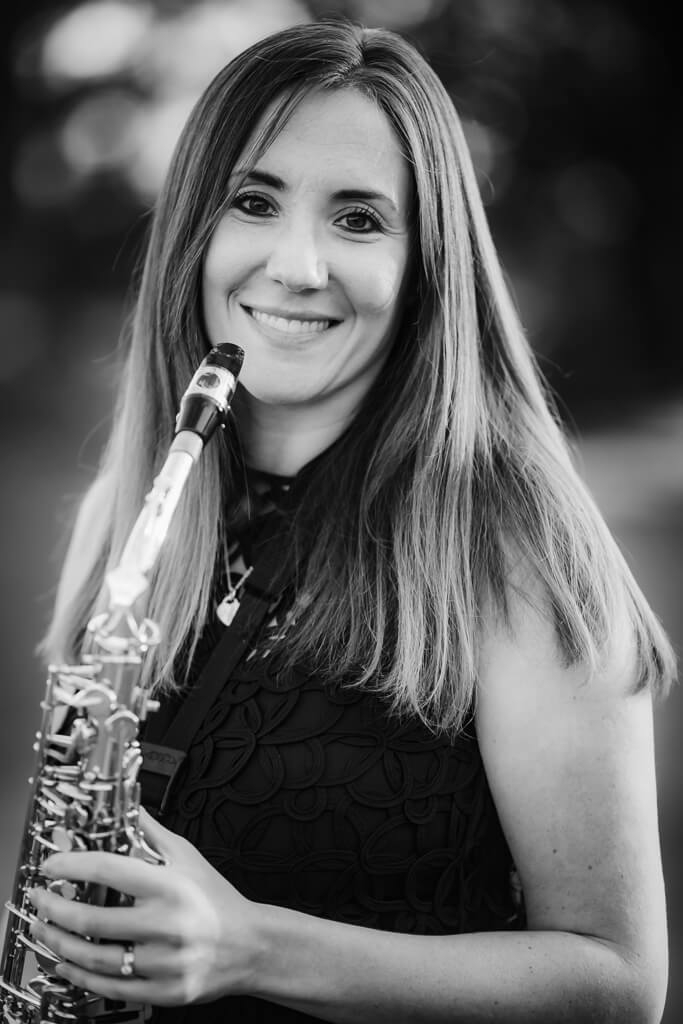 Jenna of NI Saxophone Quartet closeup promotional image B&amp;W with Sax