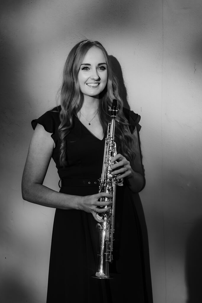 Bethany of NI Saxophone Quartet with Sax full length B&amp;W