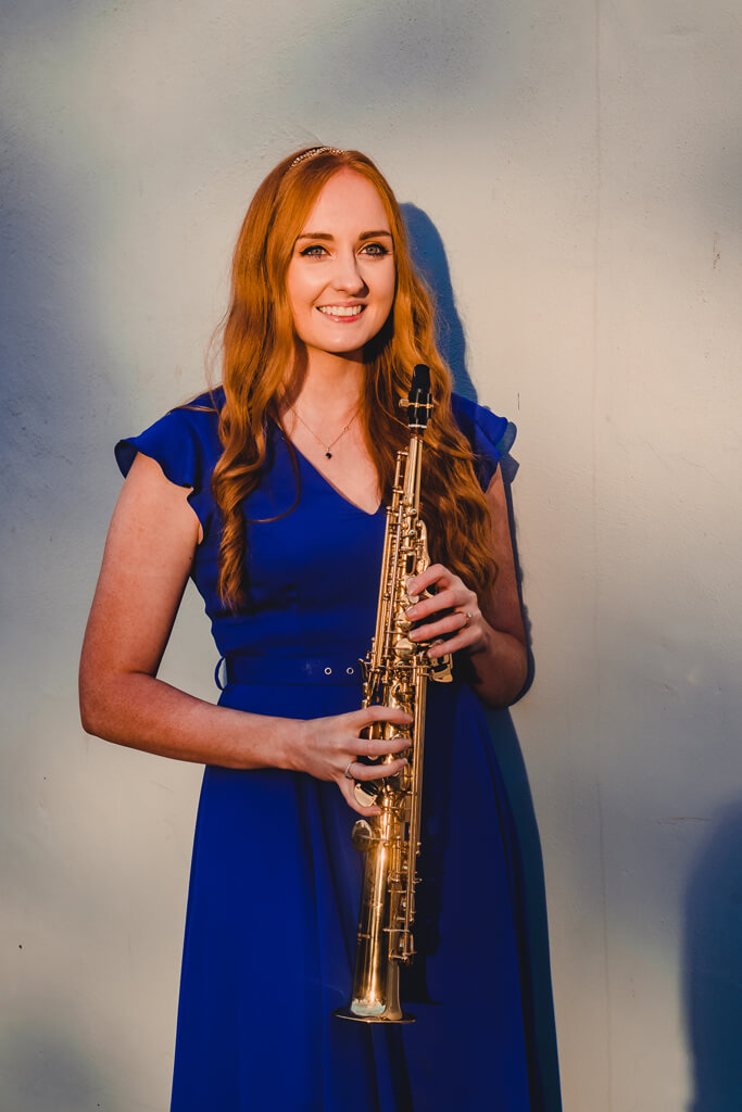 Bethany of NI Saxophone Quartet closeup promotional image colour blur background